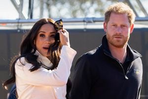 FILE - Prince Harry and Meghan Markle, Duke and Duchess of Sussex visit the track and field event at the Invictus Games in The Hague, Netherlands, Sunday, April 17, 2022.   The production company founded by Prince Harry and his wife, Meghan, are splitting ways with Spotify, Friday, June 16, 2023, less than a year after the debut of their podcast “Archetypes."(AP Photo/Peter Dejong, File)