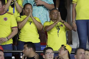 Parents of Colombia's soccer player Luiz Diaz, Luis Manuel Díaz, right, and Cinelis Marulanda , holds their hands in prayer before the start a qualifying soccer match between Colombia and Brazil for the FIFA World Cup 2026, at the Roberto Melendez stadium in Barranquilla, Colombia, Thursday, Nov. 16, 2023. The father of Liverpool striker Luis Díaz was released Thursday by members of a guerrilla group who kidnapped him in northern Colombia, the government announced, ending a 12-day ordeal for the family. (AP Photo/Ivan Valencia)