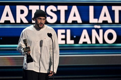 CORAL GABLES, FLORIDA - OCTOBER 05: Bad Bunny accepts an award onstage during the 2023 Billboard Latin Music Awards at Watsco Center on October 05, 2023 in Coral Gables, Florida. (Photo by Jason Koerner/Getty Images)