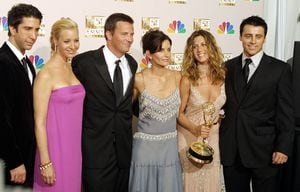 (FILES) In this file photo cast members from "Friends," which won Outstanding Comedy, series pose for photogarpher at the 54th Annual Emmy Awards at the Shrine Auditorium in Los Angeles 22 September 2002. - "The One Where They Get Back Together" is finally upon us -- and the cast of "Friends" will be joined by famous fans from Justin Bieber to David Beckham, HBO Max announced on May 13, 2021. The long-delayed and much-hyped reunion, billed as an "unscripted celebration" of the US smash hit television sitcom, will debut on May 27, the streaming platform said in a statement.A brief trailer for "Friends: The Reunion" showed the six cast members walking slowly away from the camera with their arms linked together, while the iconic "I'll Be There For You" theme song plays gently in the background. (Photo by LEE CELANO / AFP)