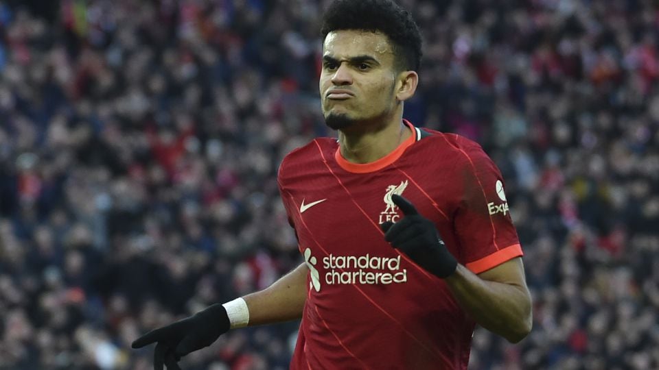 Liverpool's Luis Diaz celebrates after scoring his sides 3rd goal during the English Premier League soccer match between Liverpool and Norwich City and at Anfield stadium in Liverpool, England, Saturday, Feb. 19, 2022. (AP/Rui Vieira)
