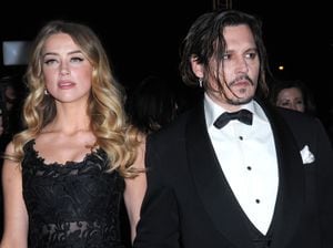 (L-R) Actress Amber Heard and actor Johnny Depp arrive at the 27th Annual Palm Springs International Film Festival at Palm Springs Convention Center on January 02, 2016 in Palm Springs, California. (Photo by Barry King/Getty Images)