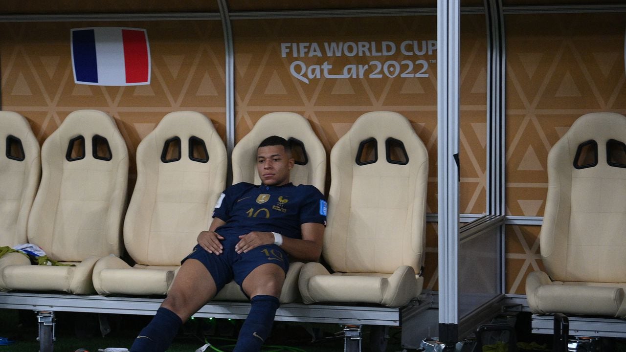 France's forward #10 Kylian Mbappe reacts after losing in the penalty shoot-out of the Qatar 2022 World Cup football final match between Argentina and France at Lusail Stadium in Lusail, north of Doha on December 18, 2022. (Photo by FRANCK FIFE / AFP)