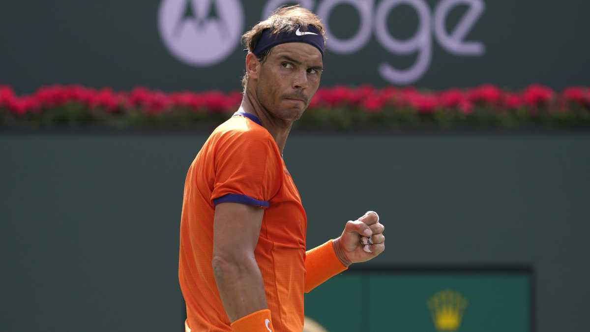 FILE - Rafael Nadal, of Spain, celebrates winning a game against Carlos Alcaraz, of Spain, during their men's singles semifinals at the BNP Paribas Open tennis tournament, March 19, 2022, in Indian Wells, Calif. Nadal on Tuesday, April 26 that he will play the Madrid Open after recovering from a rib injury that sidelined him for a month. The Madrid Open starts Friday, April 29. (AP/Mark J. Terrill, file)