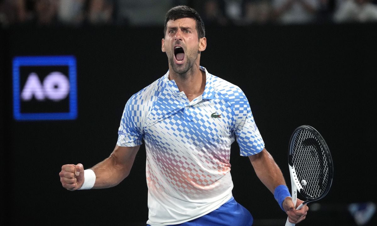 Novak Djokovic of Serbia reacts during his quarterfinal against Andrey Rublev of Russia at the Australian Open tennis championship in Melbourne, Australia, Wednesday, Jan. 25, 2023. (AP/Dita Alangkara)