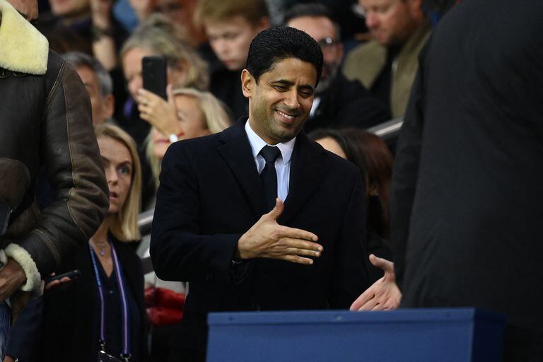 Paris Germain's Qatari president Nasser Al-Khela�fi is greeted before the French L1 football match between Paris Saint-Germain (PSG) and OGC Nice at The Parc des Princes Stadium in Paris on October 1, 2022. (Photo by FRANCK FIFE / AFP)