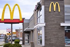 CHICAGO, UNITED STATES - APRIL 03: The logos of the American fast food company McDonalds is seen outside one of the stores in Chicago, United States on April 03, 2023. McDonaldâs reportedly temporarily shuts its U.S. corporate offices ahead of layoffs. (Photo by Jacek Boczarski/Anadolu Agency via Getty Images)