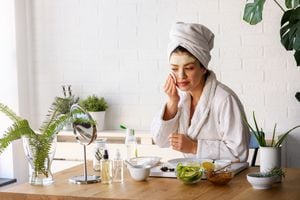 Woman at home having skin care routine. Concept of natural cosmetics skin care.