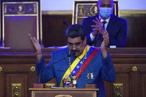 Venezuelan President Nicolas Maduro delivers his annual address to the nation before lawmakers at the National Assembly in Caracas, Venezuela, Tuesday, Jan. 12, 2021. (AP Photo/Matias Delacroix)