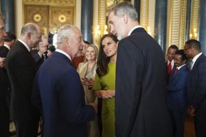 Britain's King Charles speaks to King Felipe VI and Queen Letizia of Spain during a reception at Buckingham Palace in London Friday May 5, 2023, for a reception hosted by Britain's King Charles III, for overseas guests attending his coronation. (Jacob King, Pool via AP)