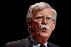 FILE - In this July 8, 2019, file photo, national security adviser John Bolton speaks at the Christians United for Israel's annual summit, in Washington.  The Justice Department says an Iranian operative has been charged in a plot to murder former Trump administration national security John Bolton.  (AP Photo/Patrick Semansky, File)