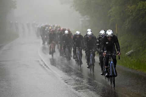 Cyclists make their way under a pouring rain during the 10th stage of the Giro D'Italia, tour of Italy cycling race, from Scandiano to Viareggio, Italy, Tuesday, May 16, 2023. (Fabio Ferrari/LaPresse via AP)