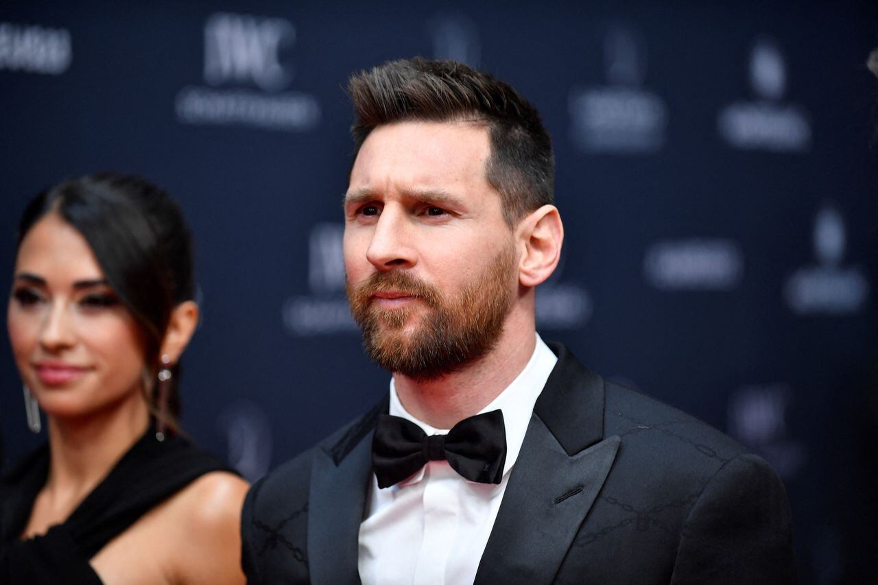 Laureus World Sportsman of the Year nominee Argentinian football player Lionel Messi (R) and his wife Antonela Roccuzzo pose on the red carpet prior to the 2023 Laureus World Sports Awards ceremony in Paris on May 8, 2023. (Photo by JULIEN DE ROSA / AFP)