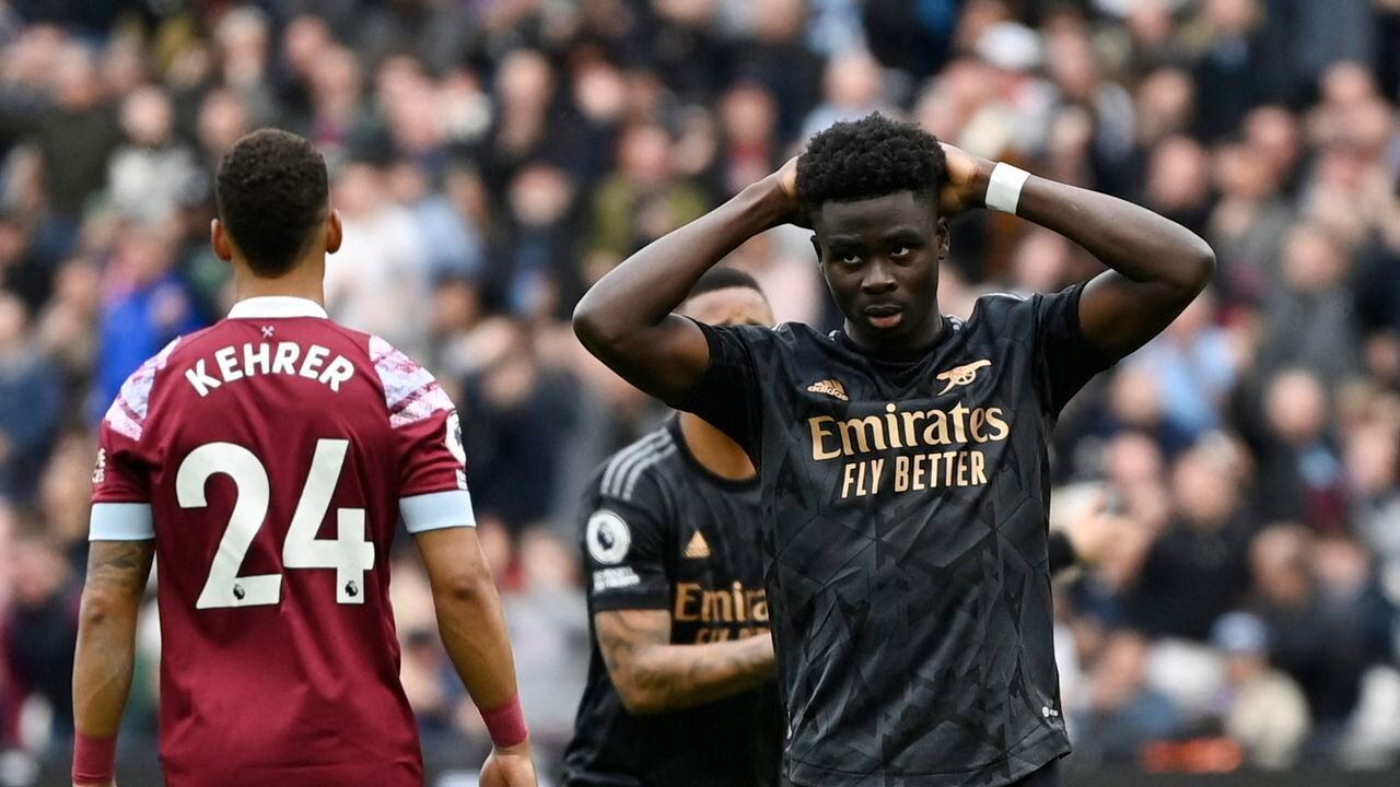 Soccer Football - Premier League - West Ham United v Arsenal - London Stadium, London, Britain - April 16, 2023 Arsenal's Bukayo Saka reacts after he misses a penalty REUTERS/Tony Obrien EDITORIAL USE ONLY. No use with unauthorized audio, video, data, fixture lists, club/league logos or 'live' services. Online in-match use limited to 75 images, no video emulation. No use in betting, games or single club /league/player publications.  Please contact your account representative for further details.
