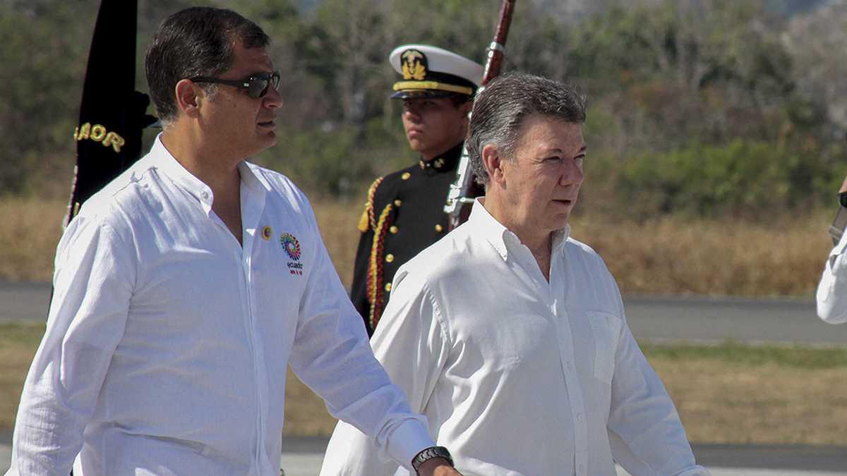 Rafael Correa y Juan Manuel Santos.