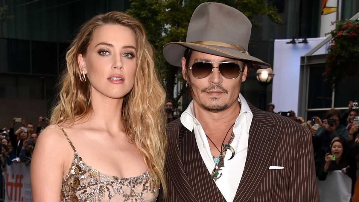 TORONTO, ON - SEPTEMBER 12:  Actors Amber Heard (L) and Johnny Depp attend "The Danish Girl" premiere during the 2015 Toronto International Film Festival at the Princess of Wales Theatre on September 12, 2015 in Toronto, Canada.  (Photo by Jason Merritt/Getty Images)