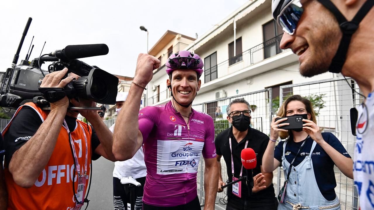 Team Groupama-FDJ's French rider Arnaud Demare celebrates with his team after winning the 6th stage of the Giro d'Italia 2022 cycling race, 192 kilometers between Palmi and Scalea, Calabria, on May 12, 2022. (Photo by Fabio FERRARI / POOL / AFP)