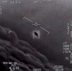 This video grab image obtained April 28, 2020 courtesy of the US Department of Defense shows part of an unclassified video taken by Navy pilots that have circulated for years showing interactions with "unidentified aerial phenomena". - The Pentagon has officially released three videos taken by US Navy pilots showing mid-air encounters with what appear to be UFOs. The grainy black and white footage had previously been leaked and the Navy had acknowledged they were Navy videos.The Department of Defense said April 27, 2020 it was "releasing the videos in order to clear up any misconceptions by the public on whether or not the footage that has been circulating was real, or whether or not there is more to the videos." (Photo by Handout / DoD / AFP) / RESTRICTED TO EDITORIAL USE - MANDATORY CREDIT "AFP PHOTO /US DEPARTMENT OF DEFENSE/HANDOUT " - NO MARKETING - NO ADVERTISING CAMPAIGNS - DISTRIBUTED AS A SERVICE TO CLIENTS