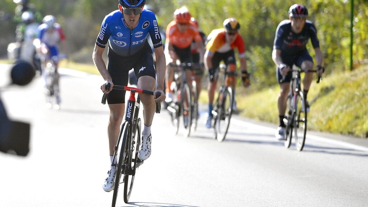 Australia's Ben O' Connor pedals on his way to win the 17th stage of the Giro d'Italia cycling race from Bassano del Grappa to Madonna di Campiglio, northern Italy, Wednesday, Oct. 21, 2020. (Fabio Ferrari/LaPresse via AP)