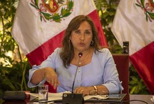 Dina Boluarte, Peru's president, speaks during a press conference at the Government Palace in Lima, Peru, on Friday, Feb. 10, 2023. Boluarte called on congress to pass a bill that would bring elections forward just hours before the current legislative session is set to end. Photographer: Fabiola Granda/Bloomberg via Getty Images