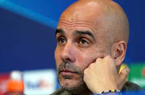 Manchester City manager Pep Guardiola meets the media during a press conference ahead of Wednesday's Champions League, semifinal, return-leg soccer match against Real Madrid, at City Football Academy, Manchester, England, Tuesday May 16, 2023. (Martin Rickett/PA via AP)