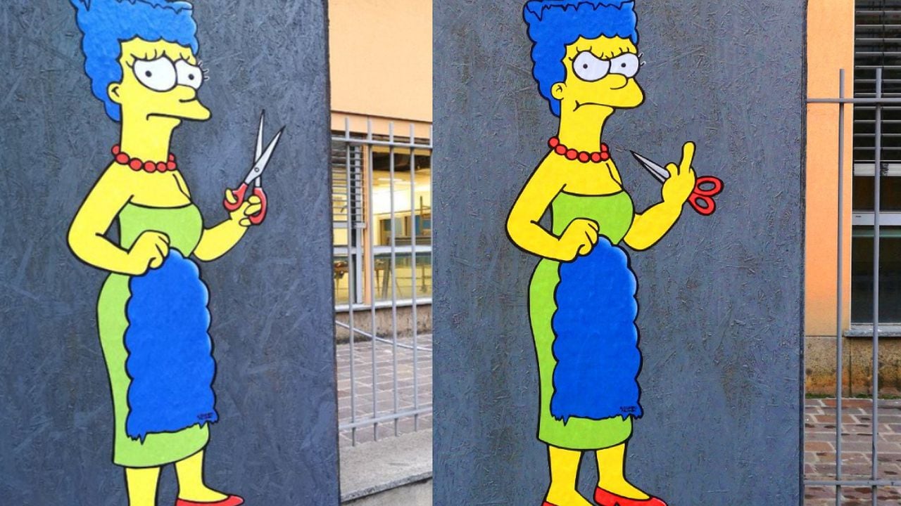 El artista rechazó la censura de la primera imagen, y desafió a las autoridades con una nueva versión de su mural.  Ahora el personaje luce bravo.