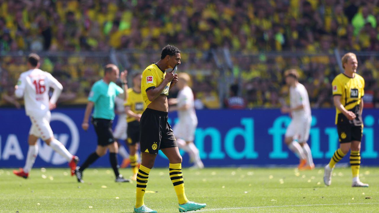 DORTMUND, GERMANY - MAY 27: Sebastien Haller  of Borussia Dortmund reacts after Karim Onisiwo of 1.FSV Mainz 05 (not pictured) scored their sides second goal during the Bundesliga match between Borussia Dortmund and 1. FSV Mainz 05 at Signal Iduna Park on May 27, 2023 in Dortmund, Germany. (Photo by Lars Baron/Getty Images)