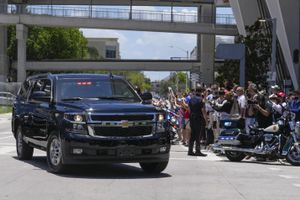 The motorcade carrying former President Donald Trump arrives at the Wilkie D. Ferguson Jr. U.S. Courthouse, Tuesday, June 13, 2023, in Miami. Trump is making a federal court appearance on dozens of felony charges accusing him of illegally hoarding classified documents and thwarting the Justice Department's efforts to get the records back. (AP Photo/Lynne Sladky)