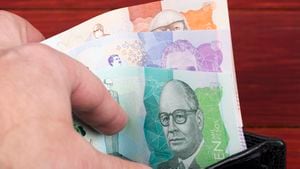 Dinero colombiano - peso en la billetera negra