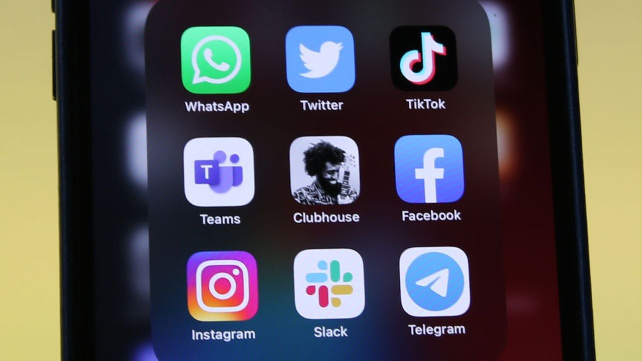 25 January 2021, Berlin: The logos of social media platforms WhatsApp (l-r), Twitter, TikTok, Microsoft Teams, Clubhouse, Facebook, Instagram, Slack and Telegram are seen on an iPhone 12 Pro Max. Photo: Christoph Dernbach/dpa (Photo by Christoph Dernbach/picture alliance via Getty Images)
