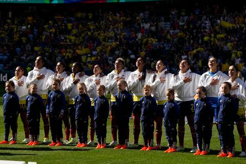 Colombia's team sing the national anthem before the start of the Women's World Cup Group H soccer match between Colombia and South Korea at the Sydney Football Stadium in Sydney, Australia, Tuesday, July 25, 2023. (AP Photo/Rick Rycroft)