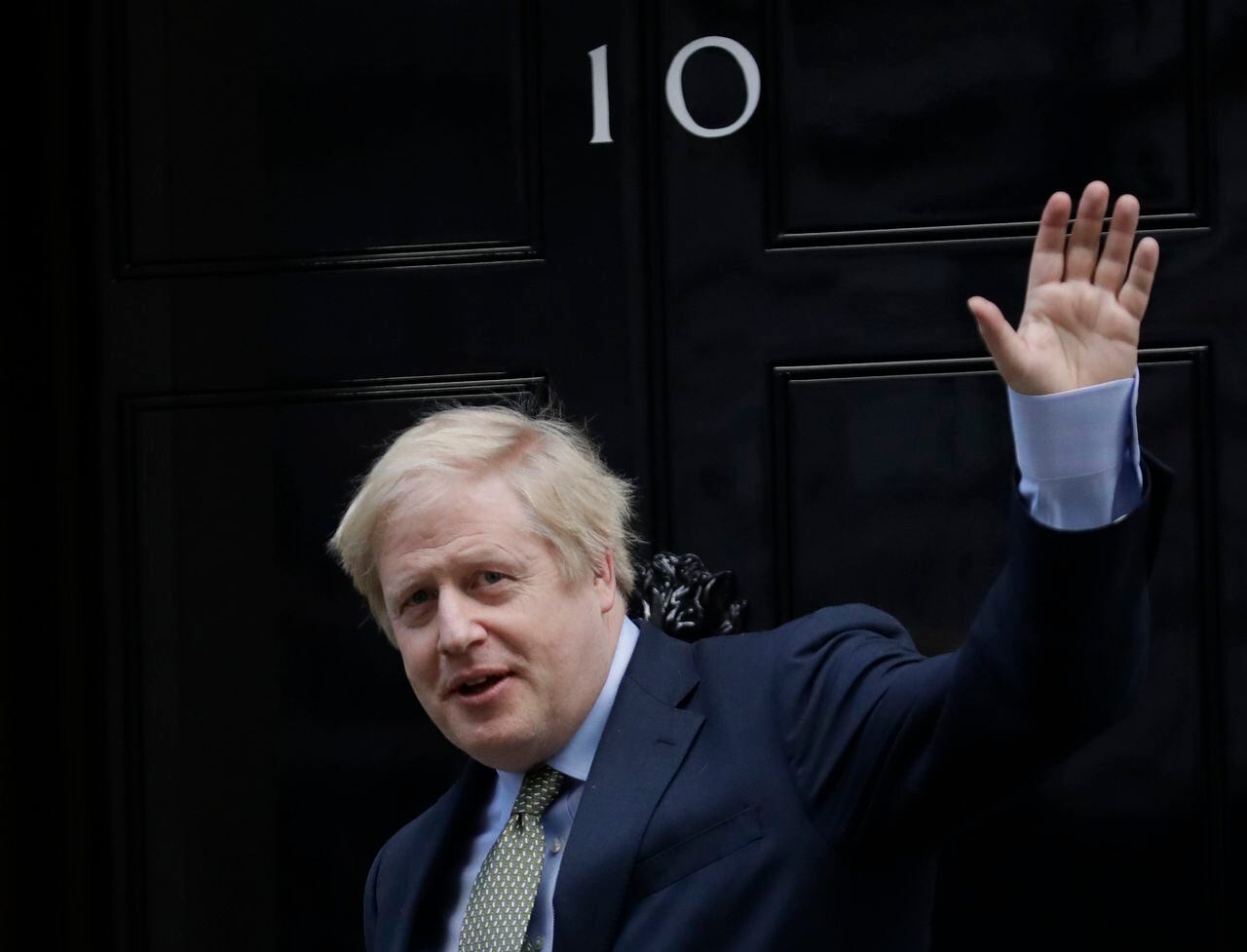 El primer ministro británico, Boris Johnson, regresa al número 10 de Downing Street después de reunirse con la reina Isabel II en el Palacio de Buckingham, Londres, el viernes 13 de diciembre de 2019.