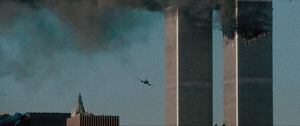 Turning Point: 9/11 and the War on Terror- A shot of the second hijacked airplane just seconds before it strikes the second tower from episode THE SYSTEM WAS BLINKING RED, Season 1 of Turning Point: 9/11 and the War on Terror. Credit: Courtesy of NETFLIX / ©NETFLIX 2021