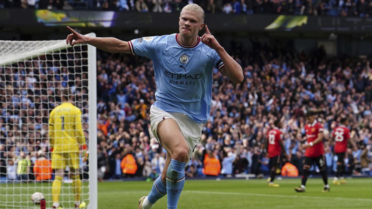 Manchester City's Erling Haaland celebrates after scoring his side's third goal during the English Premier League soccer match between Manchester City and Manchester United at Etihad stadium in Manchester, England, Sunday, Oct. 2, 2022. (AP/Martin Rickett/PA)