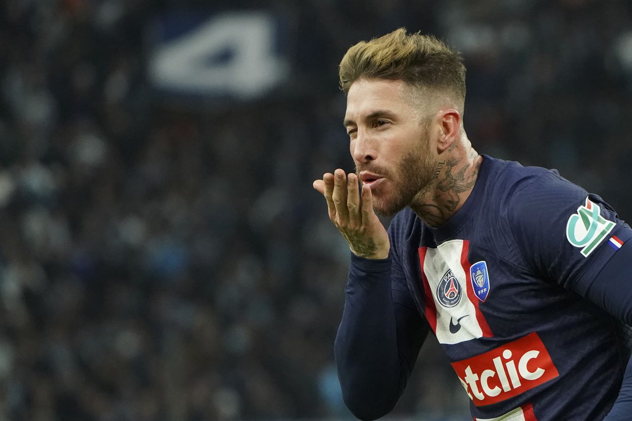 PSG's Sergio Ramos celebrates after scoring his side's opening goal during the French Cup soccer match between Olympique de Marseille and Paris Saint Germain at the Velodrome stadium in Marseille, southern France, Wednesday, Feb. 8, 2023. (AP Photo/Laurent Cipriani)