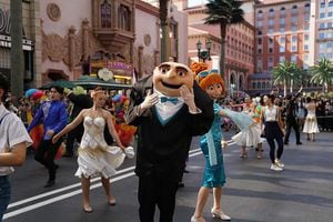 BEIJING, CHINA - SEPTEMBER 20: A cast member dressed as character Gru from 'Despicable Me' parades at the Universal Beijing Resort on September 20, 2022 in Beijing, China. The Universal Beijing Resort welcomed its first anniversary on Tuesday. (Photo by VCG/VCG via Getty Images)