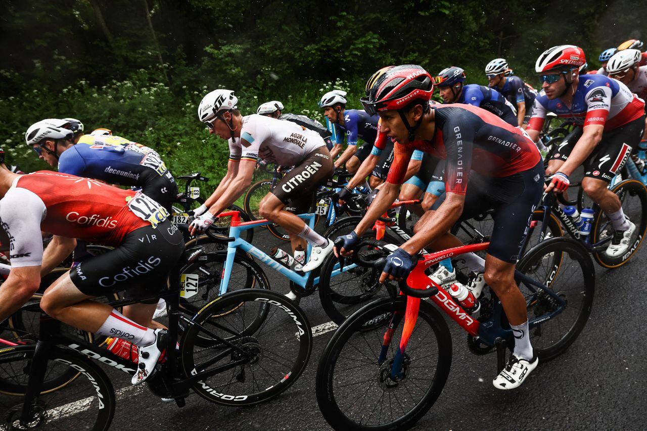INEOS Grenadiers' Colombian rider Egan Bernal (R) competes during the first stage of the 75th edition of the Criterium du Dauphine cycling race, some 158kms between Chambon-sur-Lac to Chambon-sur-Lac, central France, on June 4, 2023. (Photo by Anne-Christine POUJOULAT / AFP)