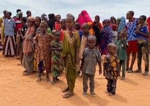 Internally displaced Somali children gather outside their makeshift shelters at the Ladan camp for internally displaced people (IDP) in Dollow, Somalia May 1, 2023. REUTERS/Ayenat Mersie