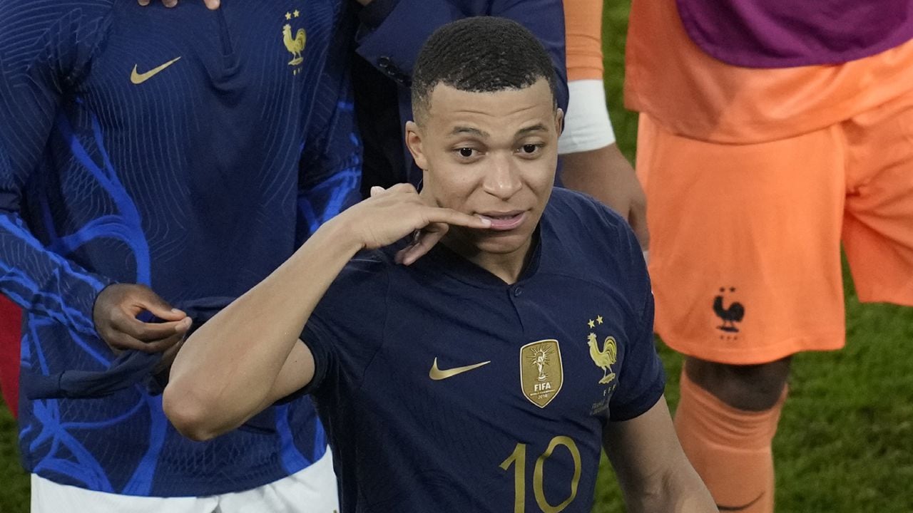 France's Kylian Mbappe gestures at the end of the World Cup round of 16 soccer match between France and Poland, at the Al Thumama Stadium in Doha, Qatar, Sunday, Dec. 4, 2022. (AP /Christophe Ena)
