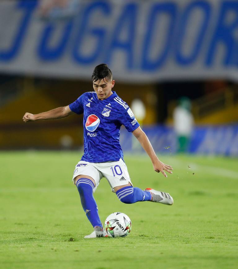 BOGOTA, COLOMBIA - MARCH 18: Daniel Ruiz of Millonarios kicks the ball during the match between Millonarios and Once Caldas as part of the Liga BetPlay at Estadio El Campin on March 18, 2022 in Bogota, Colombia. (Photo by Daniel Munoz/VIEW press/Corbis via Getty Images)