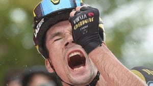 Team Jumbo's Slovenian rider Primoz Roglic celebrates as he wins the 17th stage of the 2021 La Vuelta cycling tour of Spain, a 185.8 km race from Unquera to Lagos de Covadonga on September 1, 2021. (Photo by MIGUEL RIOPA / AFP)