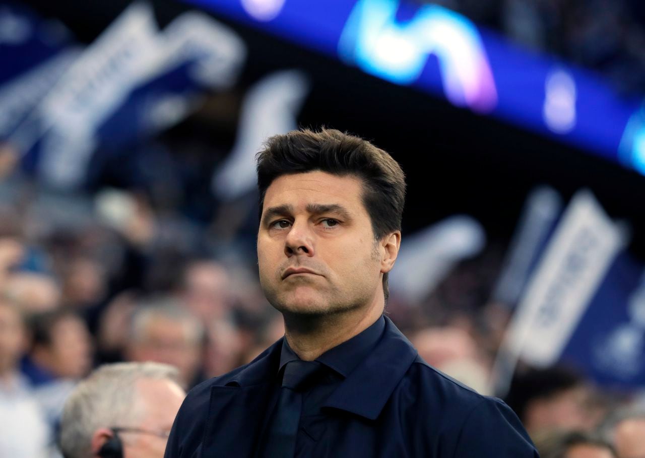 FILE - Manager Mauricio Pochettino looks on, prior to the Champions League semifinal first leg soccer match between Tottenham Hotspur and Ajax at the Tottenham Hotspur stadium in London, on April 30, 2019. Chelsea has hired Mauricio Pochettino as manager on a two-year deal with the option of another year. The Argentine coach is tasked with getting the best out of an expensively assembled squad that has underperformed at the start of a new era for the English club. (AP Photo/Kirsty Wigglesworth, File)