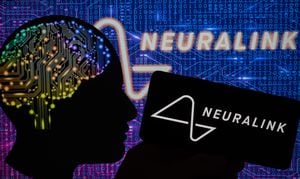 Neuralink displayed on mobile with chip brain seen on screen. On 16 April 2023 in Brussels, Belgium(Photo illustration by Jonathan Raa/NurPhoto via Getty Images)