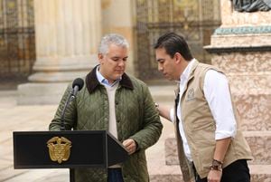 Presidente Iván Duque con el registrador Alexander Vega