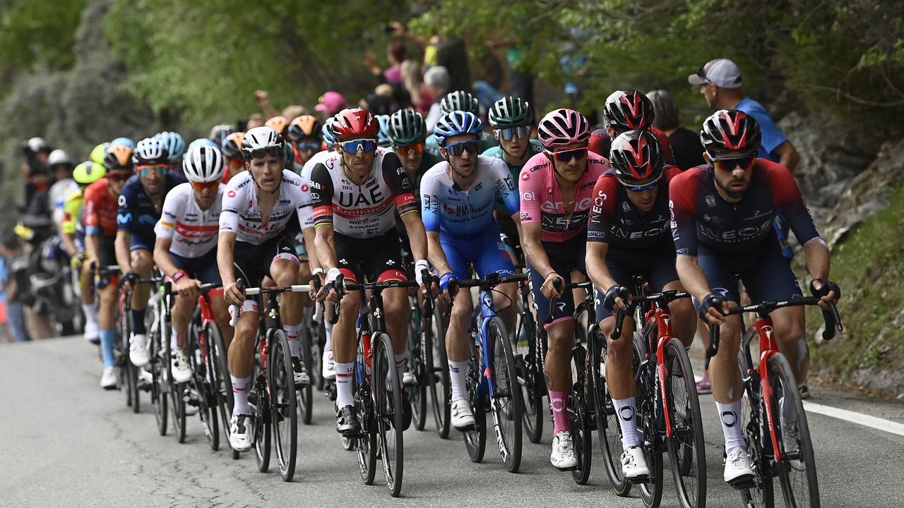 The pack of cyclists ride during the 15th stage of the Giro D'Italia cycling race from Rivarolo Canavese to Cogne, Italy, Sunday, May 22, 2022. (Fabio Ferrari/LaPresse via AP)
