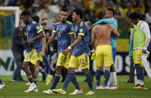 Players of Colombia leave the field after losing 1-0 against Brazil at the end of a qualifying soccer match for the FIFA World Cup Qatar 2022 at Neo Quimica Arena stadium in Sao Paulo, Brazil, Thursday, Nov.11, 2021. (AP Photo/Andre Penner)