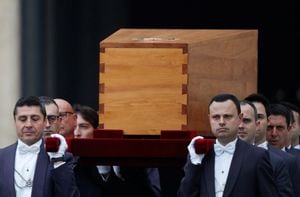 The coffin of former Pope Benedict is carried during his funeral, in St. Peter's Square at the Vatican, January 5, 2023. REUTERS/Yara Nardi