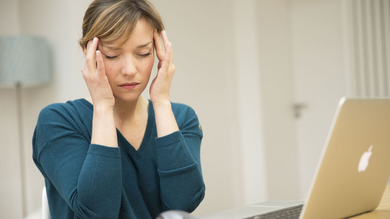 Woman suffering from headache. (Photo by: BSIP/Universal Images Group via Getty Images)