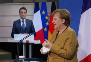 German Chancellor Angela Merkel and French President Emmanuel Macron. (Photo by Sean Gallup/Getty Images)