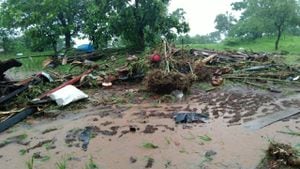 This handout picture taken on July 23, 2021 and released by the National Disaster Response Force (NDRF) shows debris of houses in Taliye village after a landslide in Mahad of Raigad district of Maharashtra. (Photo by - / NDRF / AFP) / RESTRICTED TO EDITORIAL USE - MANDATORY CREDIT "AFP PHOTO / National Disaster Response Force (NDRF) " - NO MARKETING - NO ADVERTISING CAMPAIGNS - DISTRIBUTED AS A SERVICE TO CLIENTS